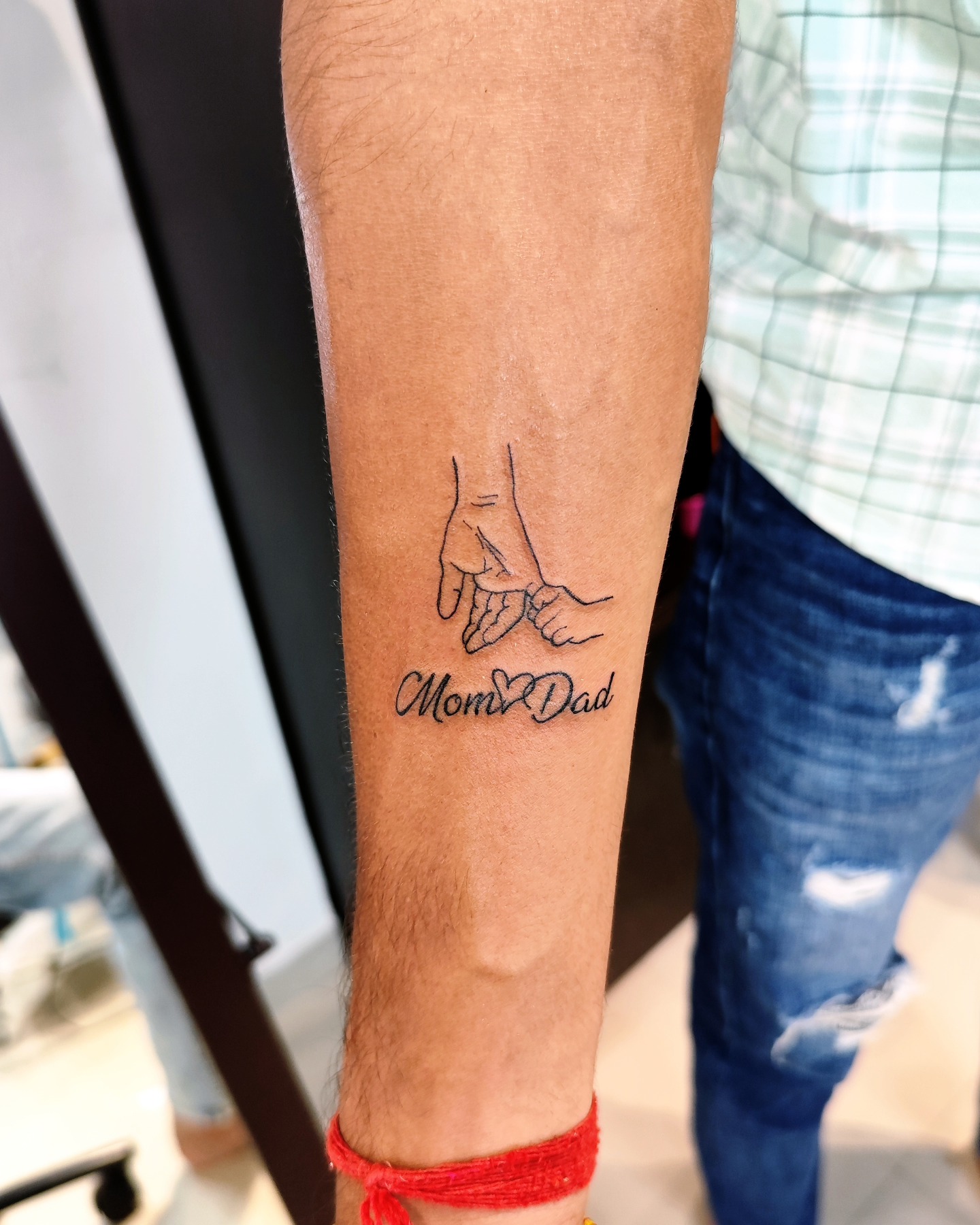 Mom and Dad Hand Holding Tattoo