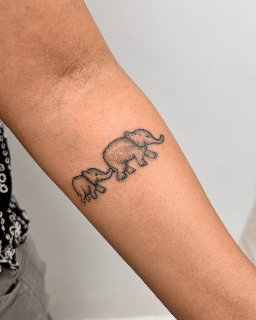 Mother & Baby Elephant Bond meaningful tattoos to check out tattoo