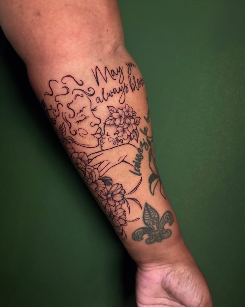 Mother and Child Blooming Love Tattoo mommy tattoo ideas tattoo