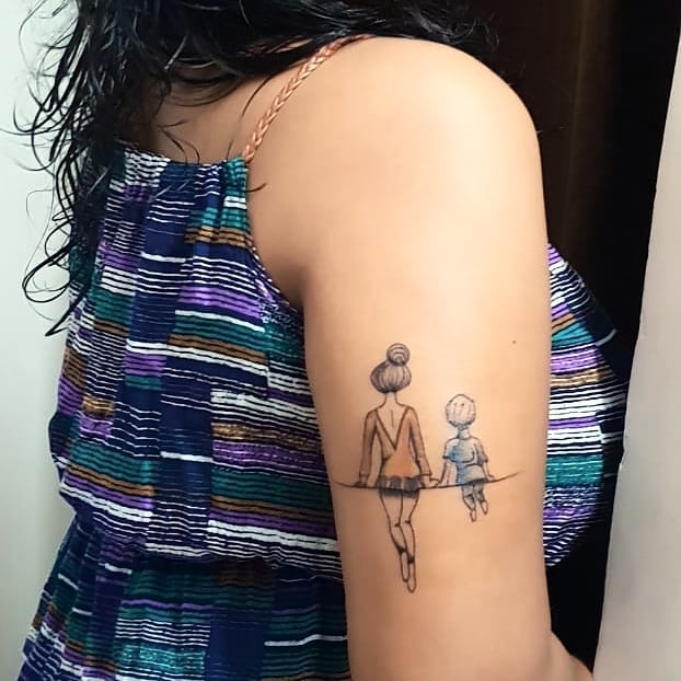 Mother and Son Sitting Together Tattoo mom and son tattoo ideas tattoo