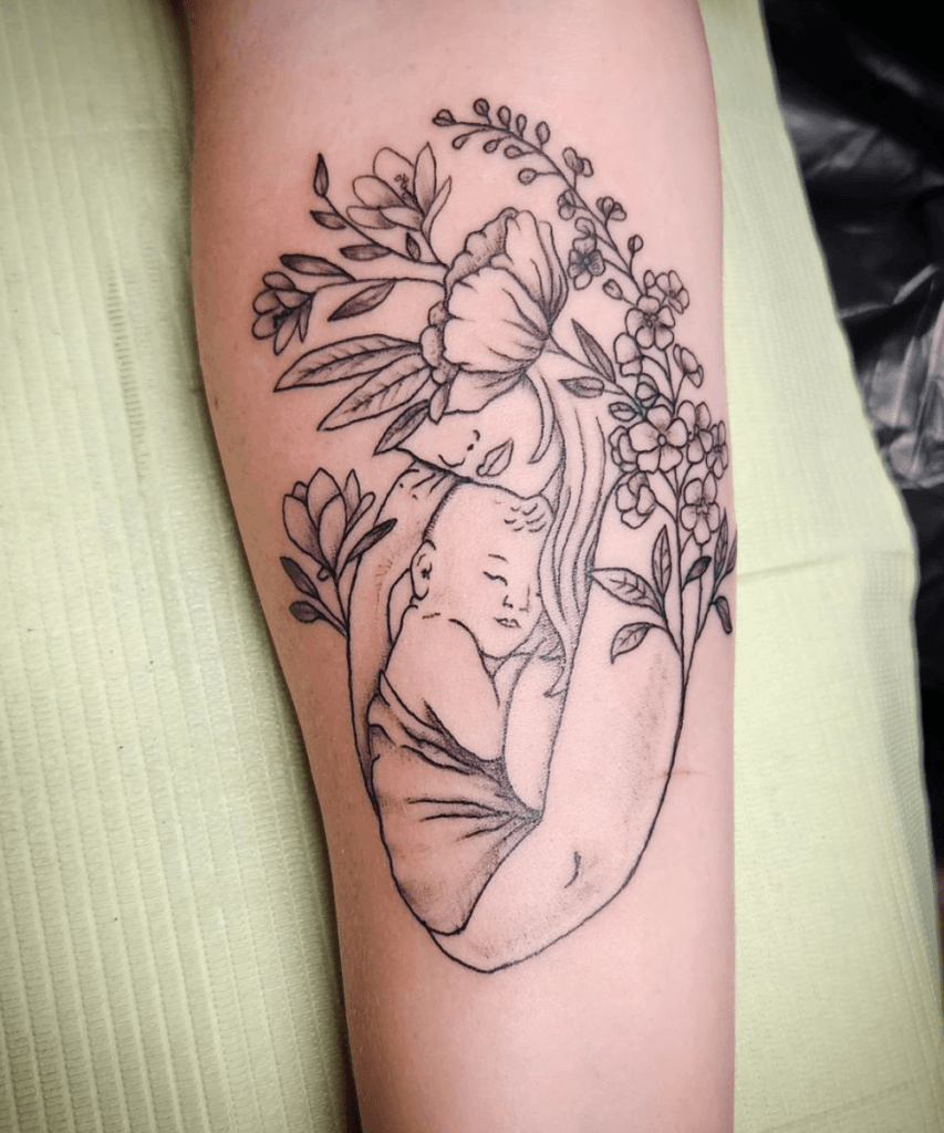 Mother Cradling her Baby mom and son tattoo ideas tattoo