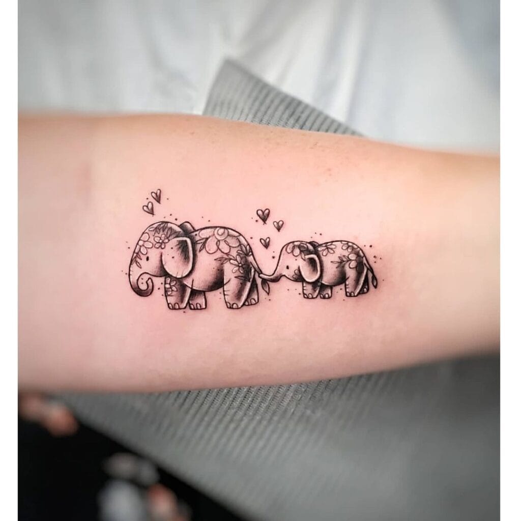 Mother-Daughter Elephant Piece mother and daughter tattoo ideas tattoo