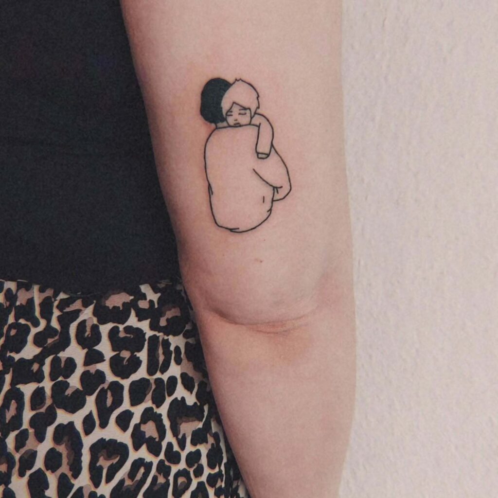 Mother Holding Child on Shoulder Tattoo mommy tattoo ideas tattoo