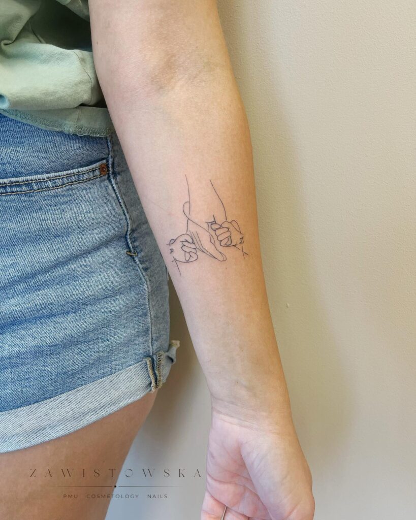 Mother Holding Children’s Hands Tattoo mommy tattoo ideas tattoo