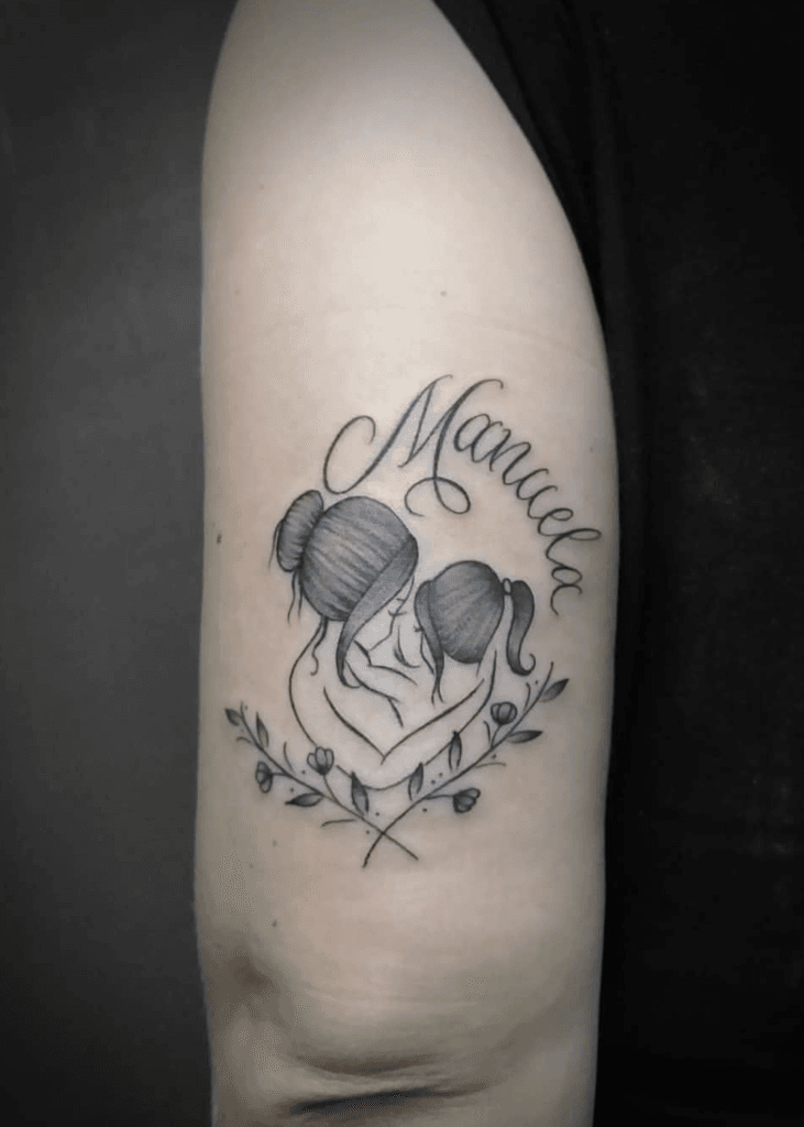 Mother Holding Toddler Daughter in Loving Embrace kids name tattoo