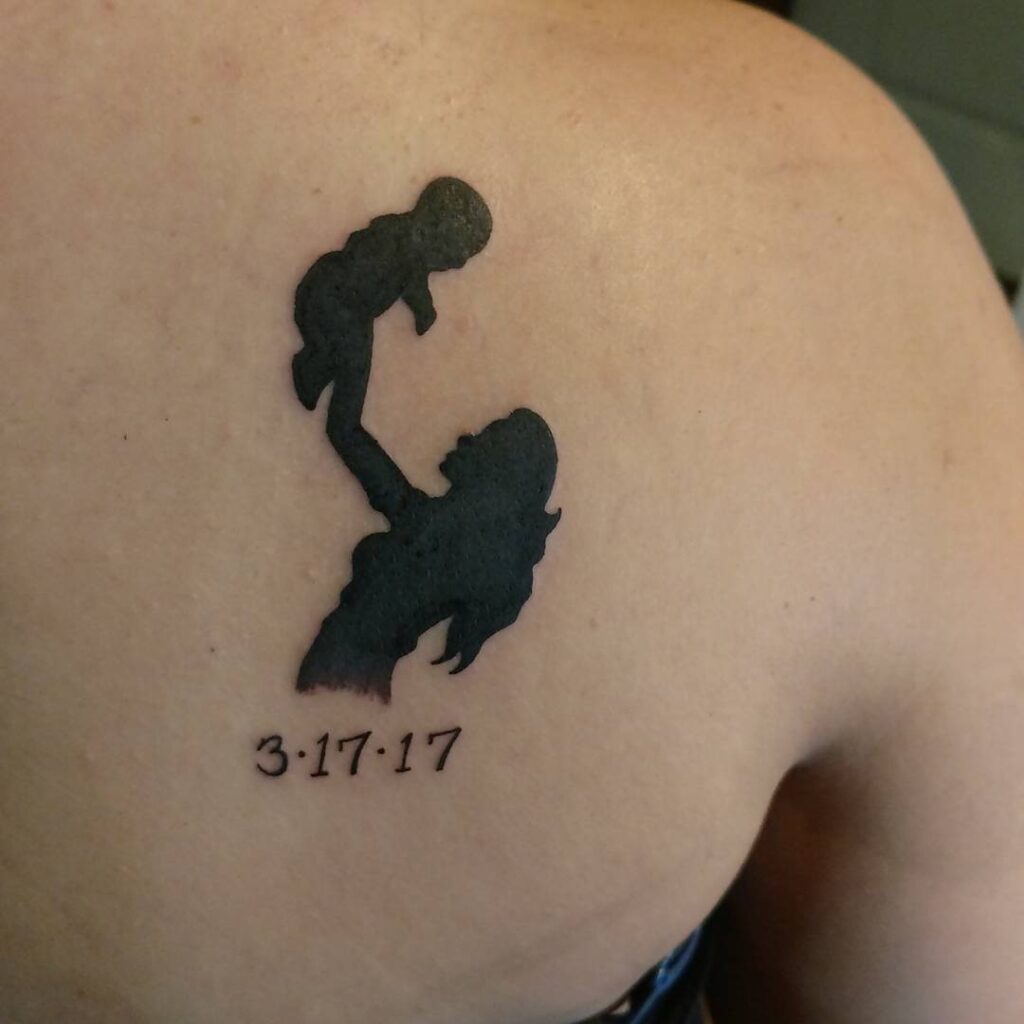Mother Lifting Child Silhouette Tattoo mommy tattoo ideas tattoo