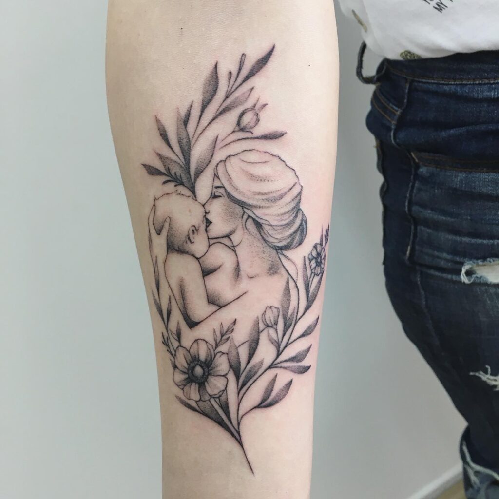 Mother’s Kiss and Floral Embrace Tattoo mom with kids tattoos tattoo