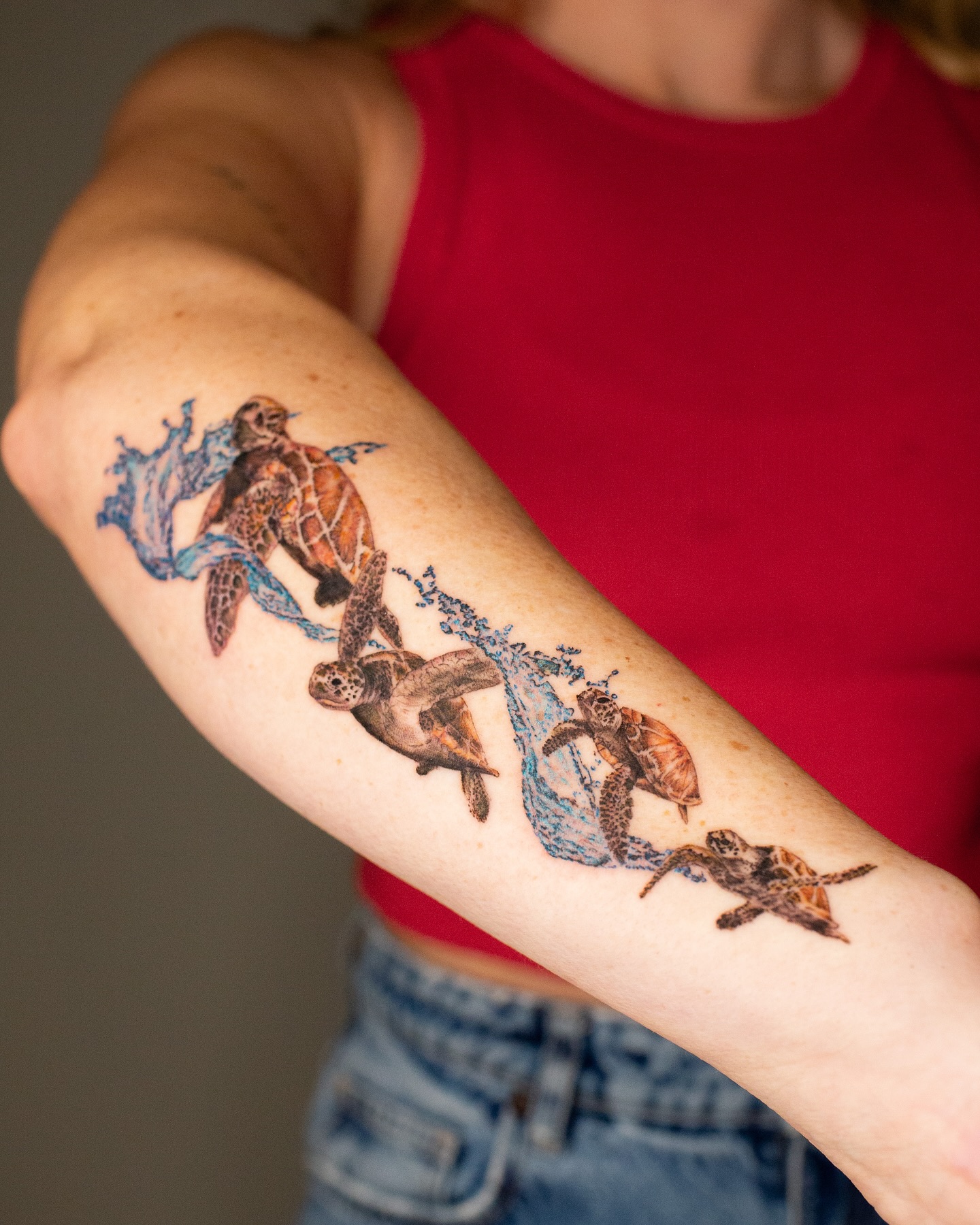 Mother Sea Turtle Guiding Miniature Hatchling sea turtle tattoo