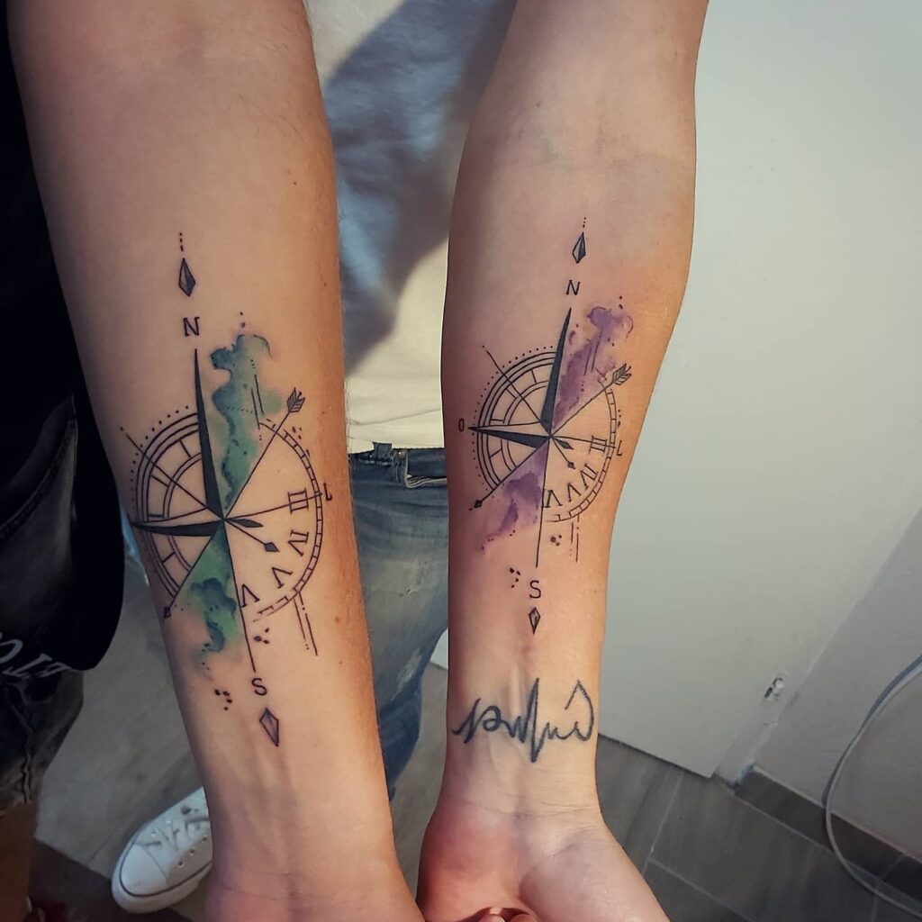Mother-Son Matching Compass Tattoo with Watercolor Accents mom and son tattoo ideas tattoo