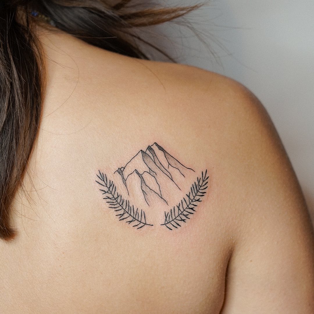 Mountain and Pine Branch Tattoo mountain tattoos ideas tattoo