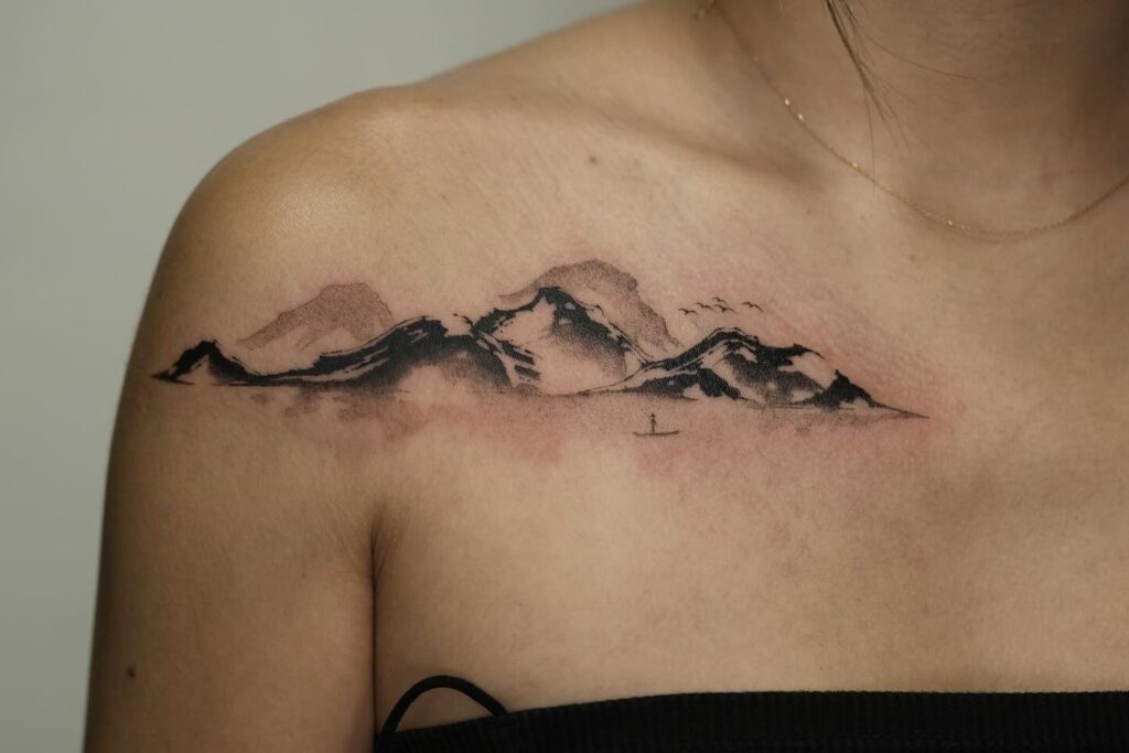 Mountain Landscape with a Boat Tattoo mountain tattoos tattoo