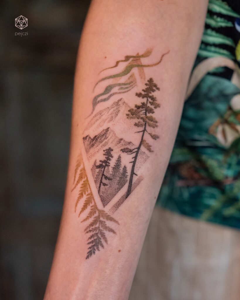 Mountain Vista Framed by Botanical Fern Fronds nature scene tattoo