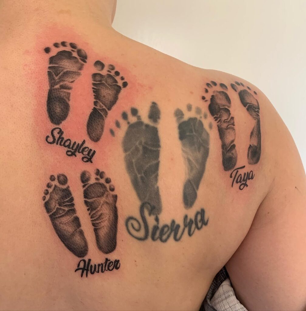 Multiple Baby Footprints with Names Tattoo baby feet tattoos tattoo