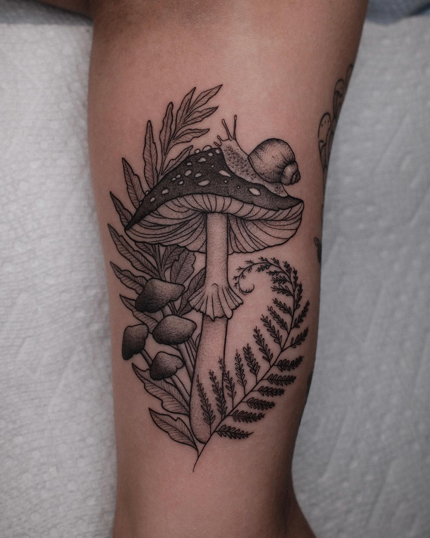 Geometric Mushroom Tattoo with Bold Leaves mushroom tattoo ideas tattoo
