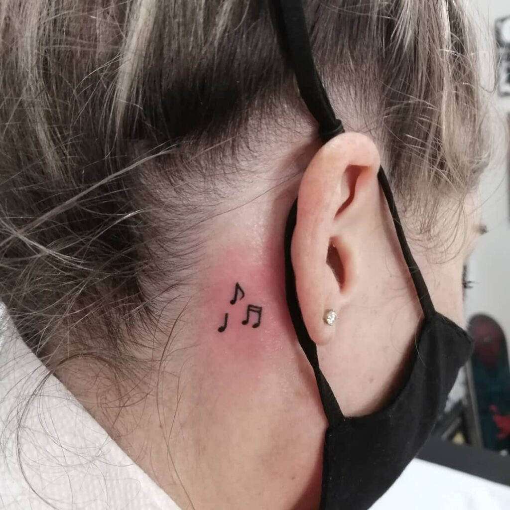 Red Twin Butterflies Behind Ear Tattoo