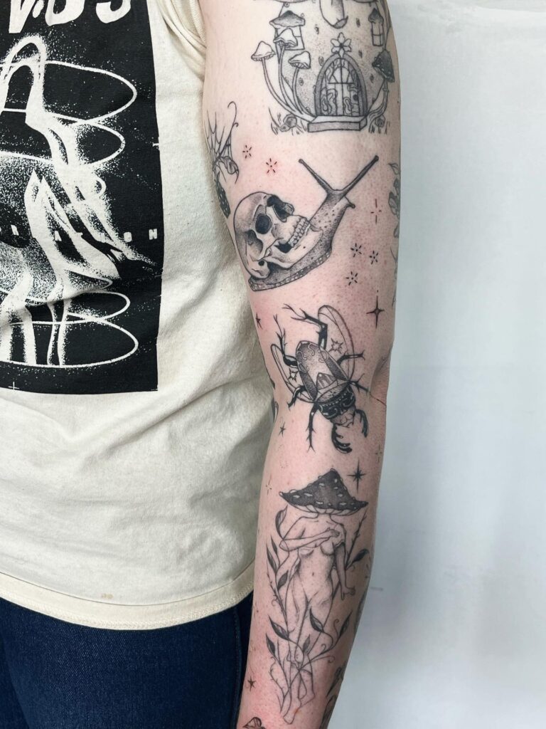 Woodland-Inspired Patchwork Leg Tattoo