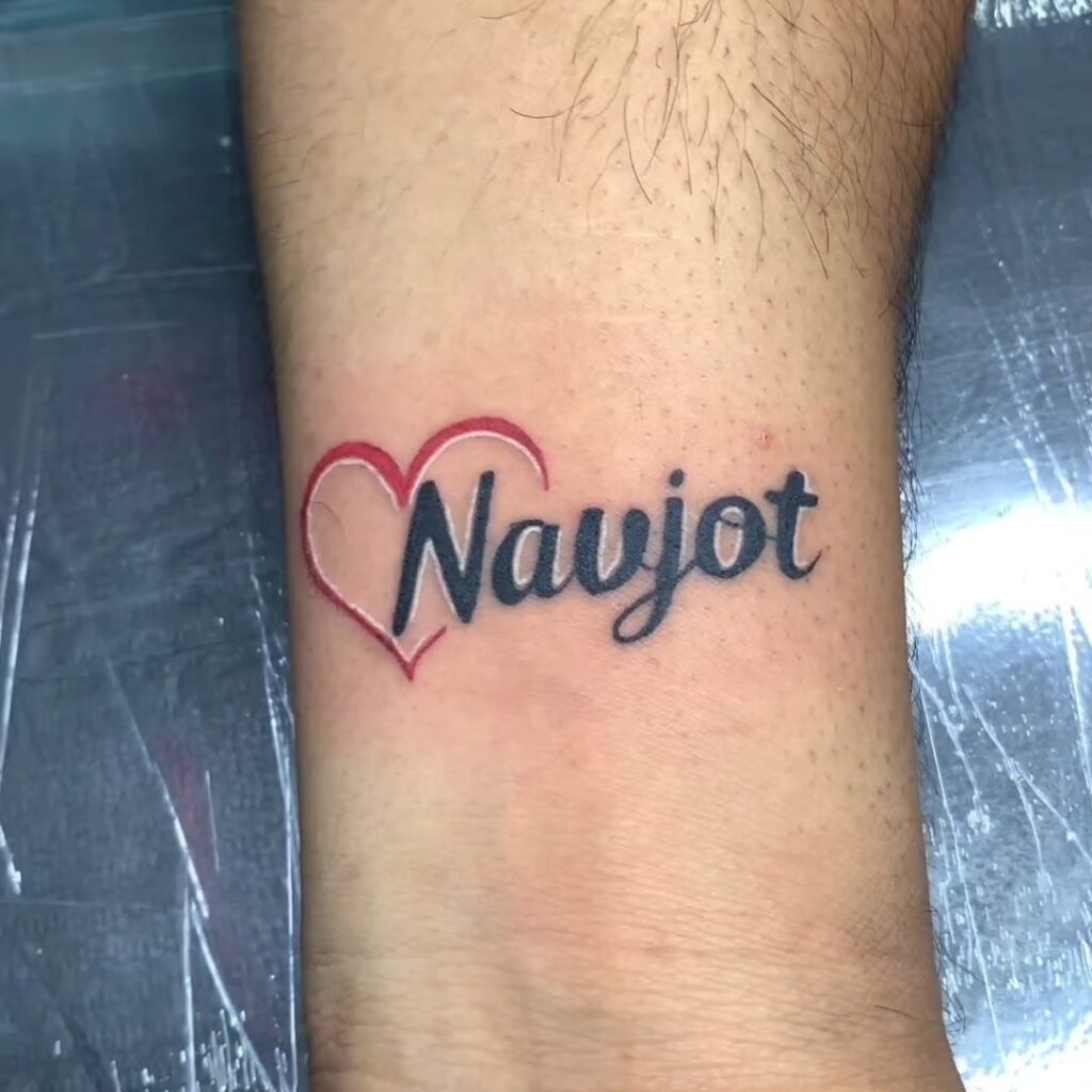 Name Wrist Script Tattoo