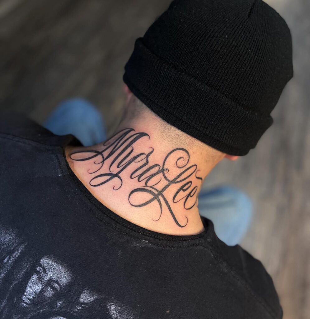 Heart And Flowers Name Tattoo