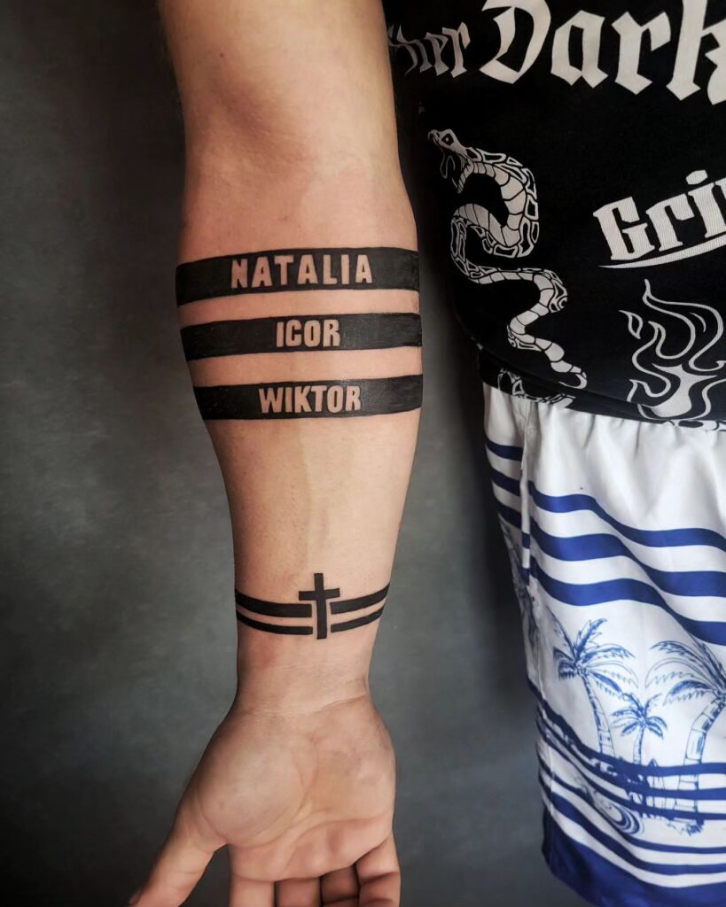 Red Script Forearm Tattoo