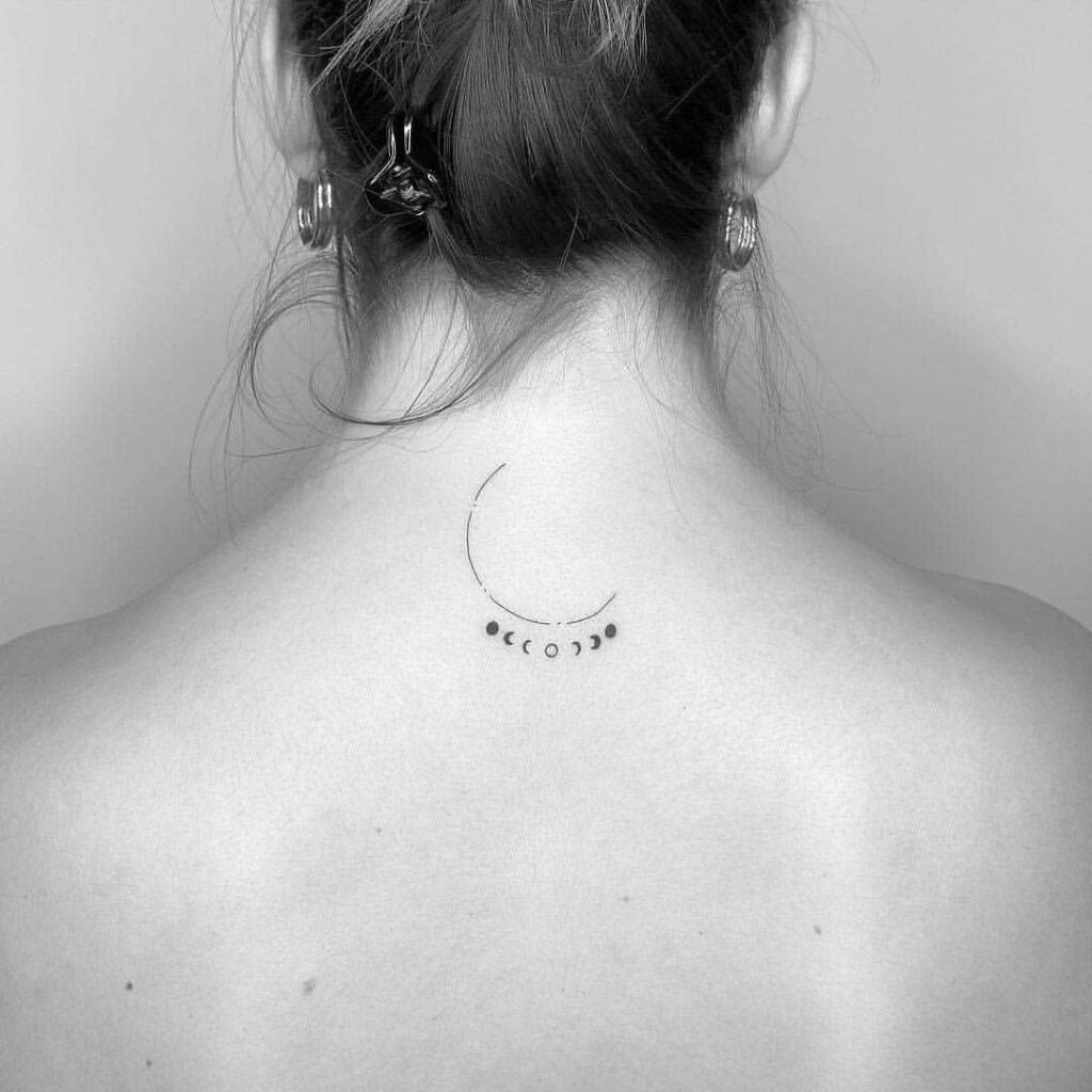 Moon phases tattoo on the back of the neck