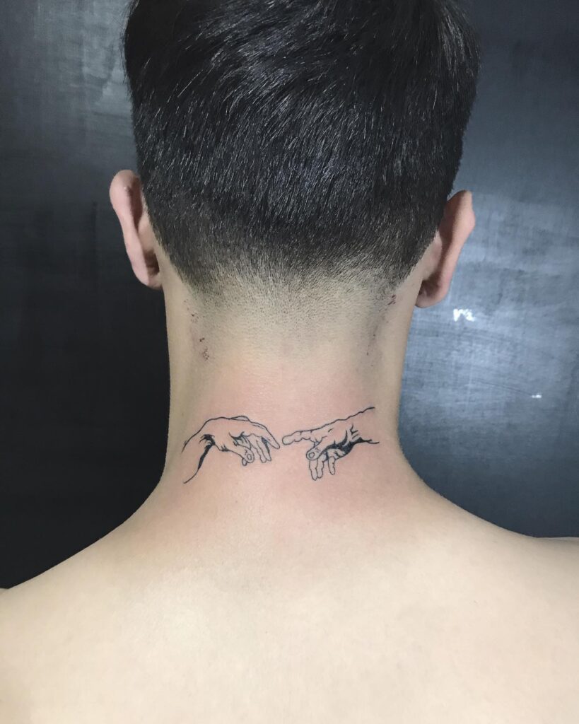 Discreet small tattoo on the nape of the neck