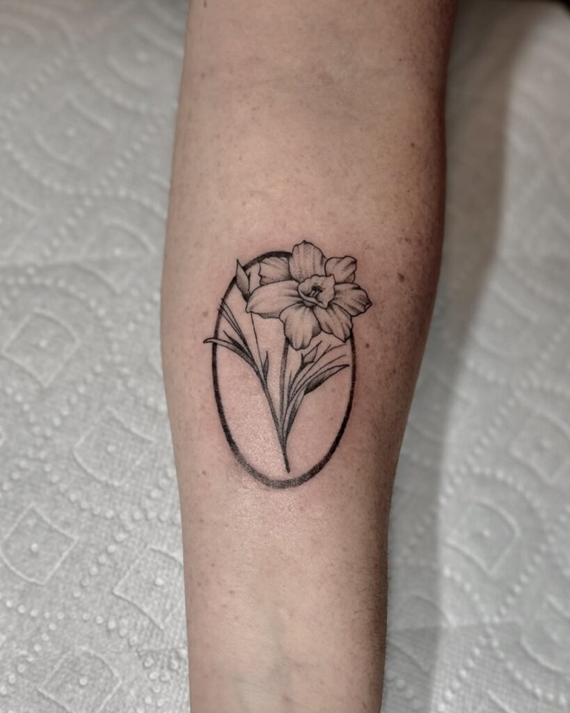 Narcissus Flower Framed in Oval Tattoo december birth flower tattoo ideas tattoo