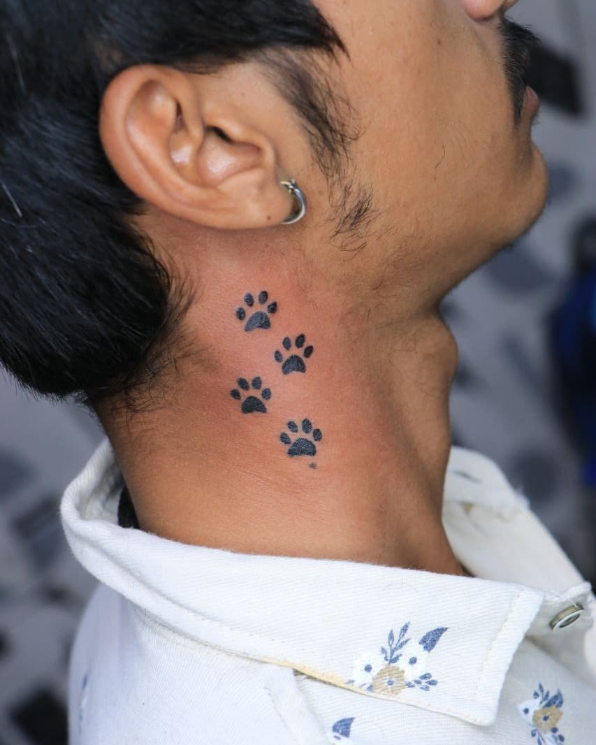 Neck Dog Paw Trail Tattoo dog paw tattoos tattoo