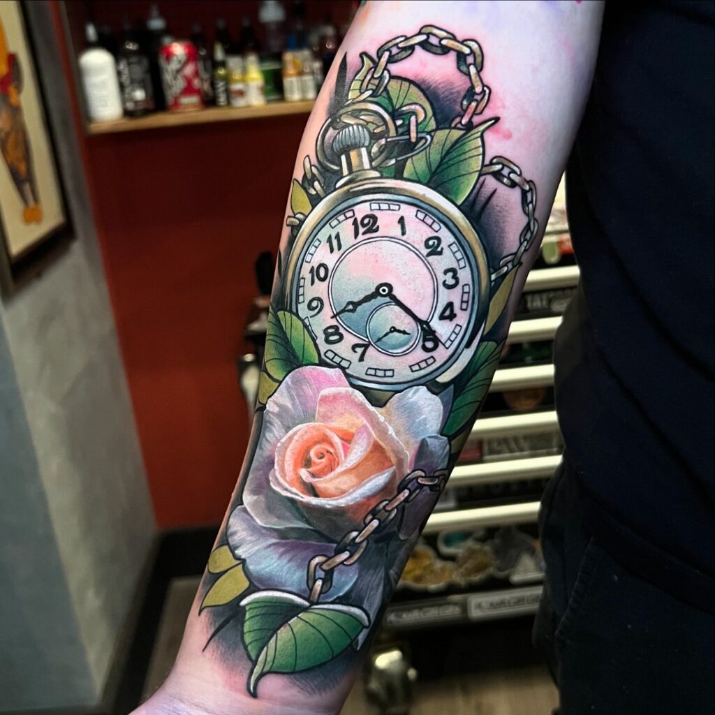 Pocket Watch with Lilies and Butterfly Tattoo pocket watch tattoos tattoo