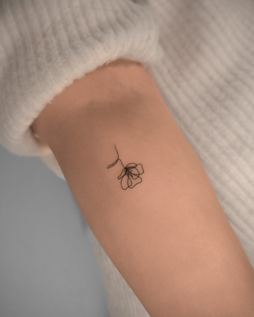 One-Line Floral Tattoo