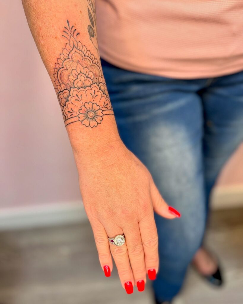Delicate Celestial Wrist Tattoo