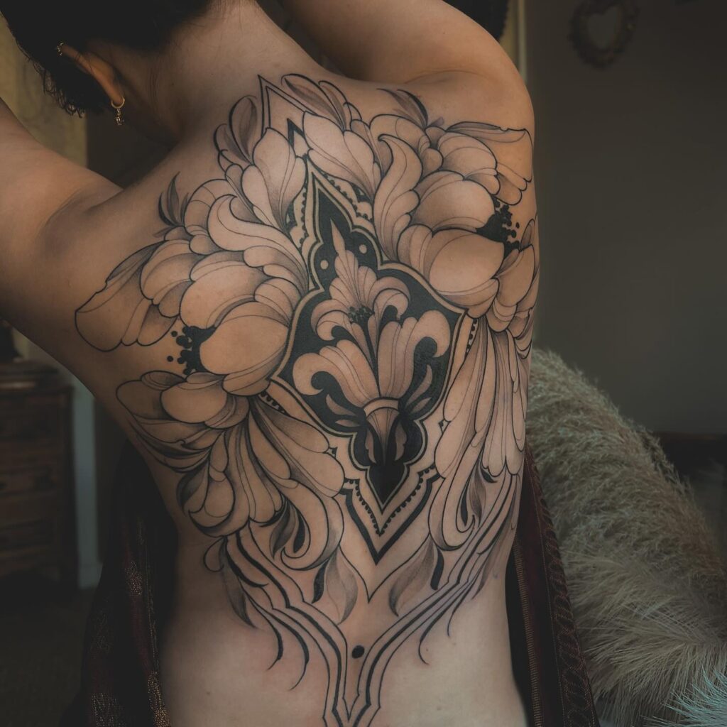 Elegant Ornamental Back Tattoo