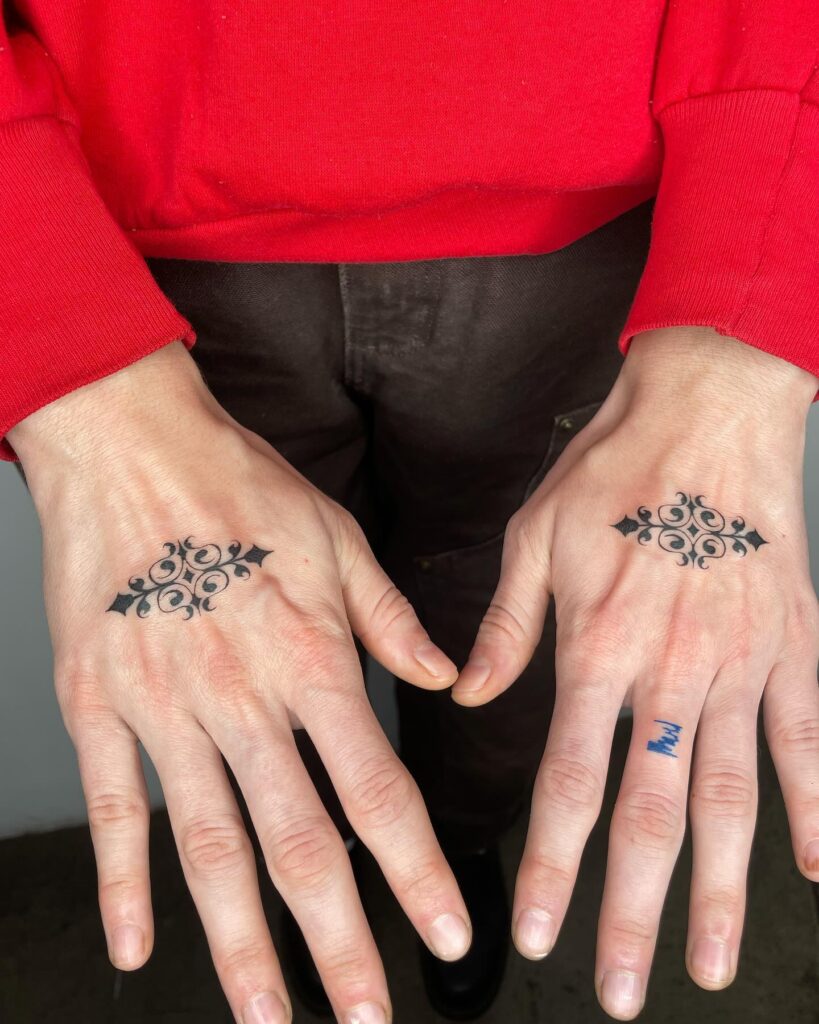 Ornamental Handpiece with Finger Accent hand tattoo ideas for guys tattoo
