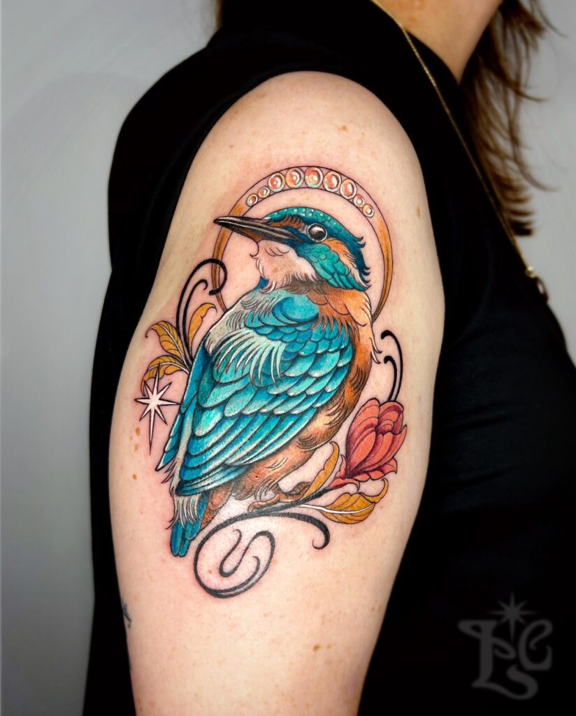 Ornamental Kingfisher Tattoo with Halo and Floral Accents bird tattoo ideas for women with meaning tattoo