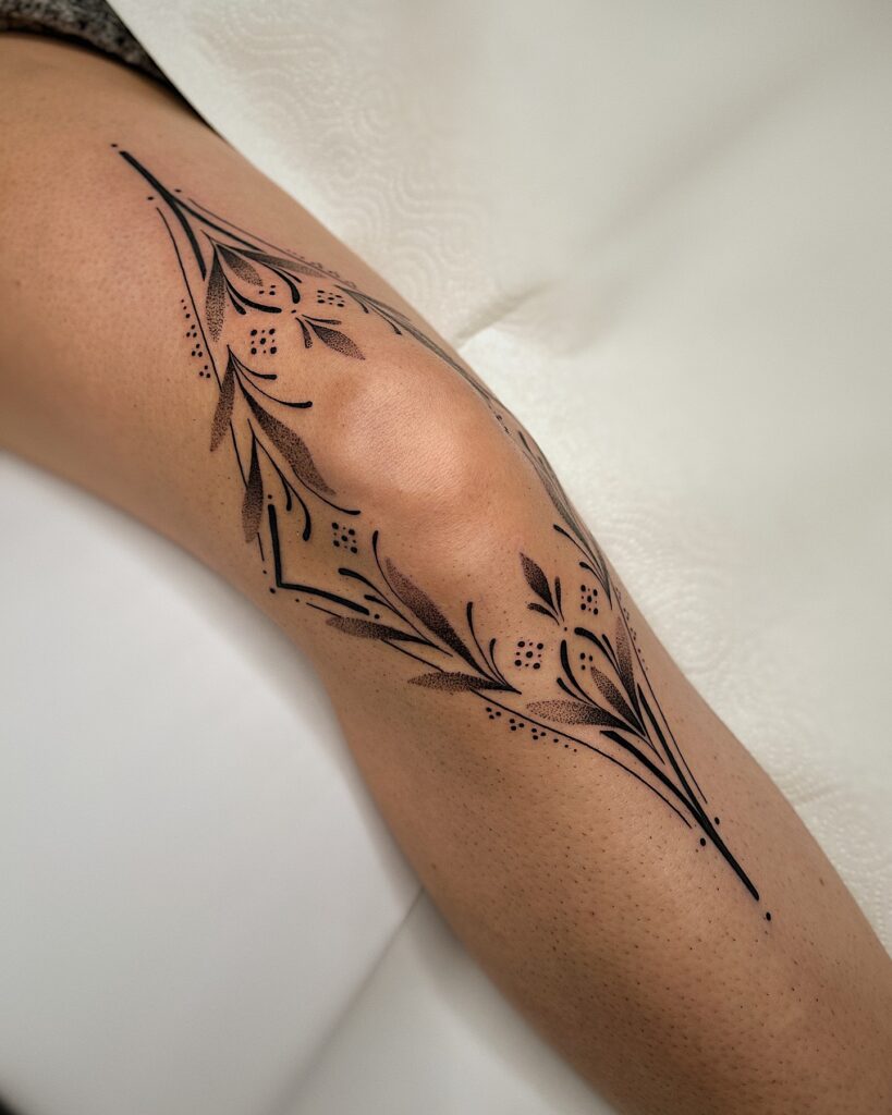 Rose And Thorn Knee Frame Tattoo