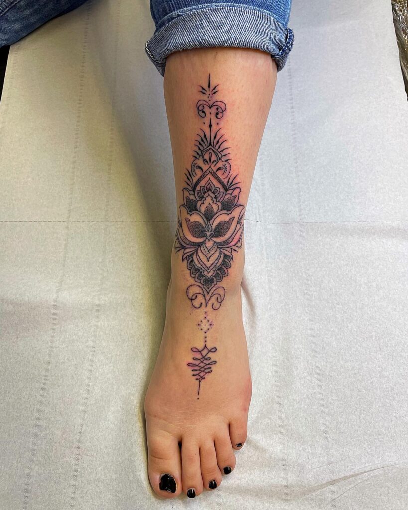 Ornamental Eyes Foot Tattoo