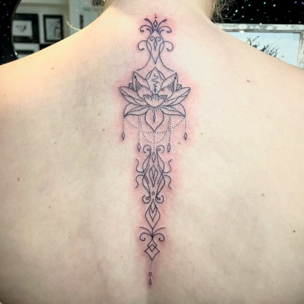Proverbs 35 Vertical Spine Tattoo