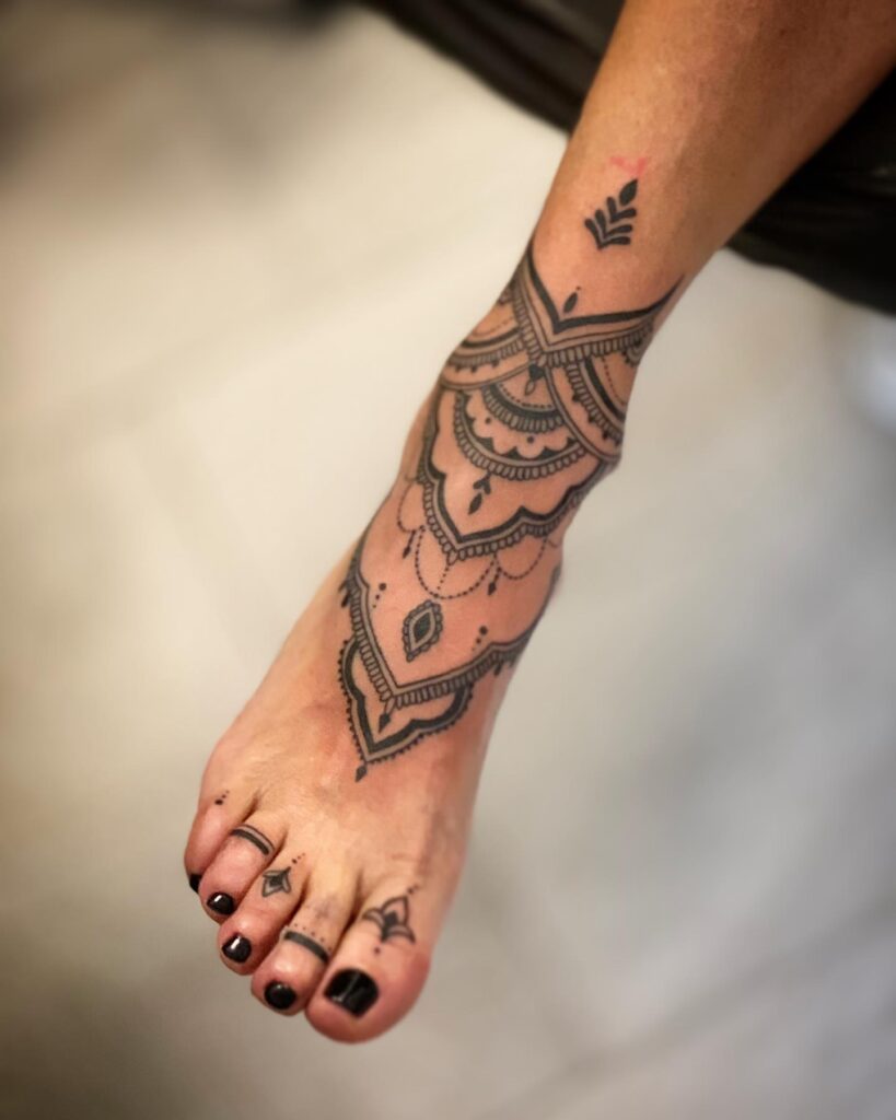 Flowing Botanical Foot Tattoo