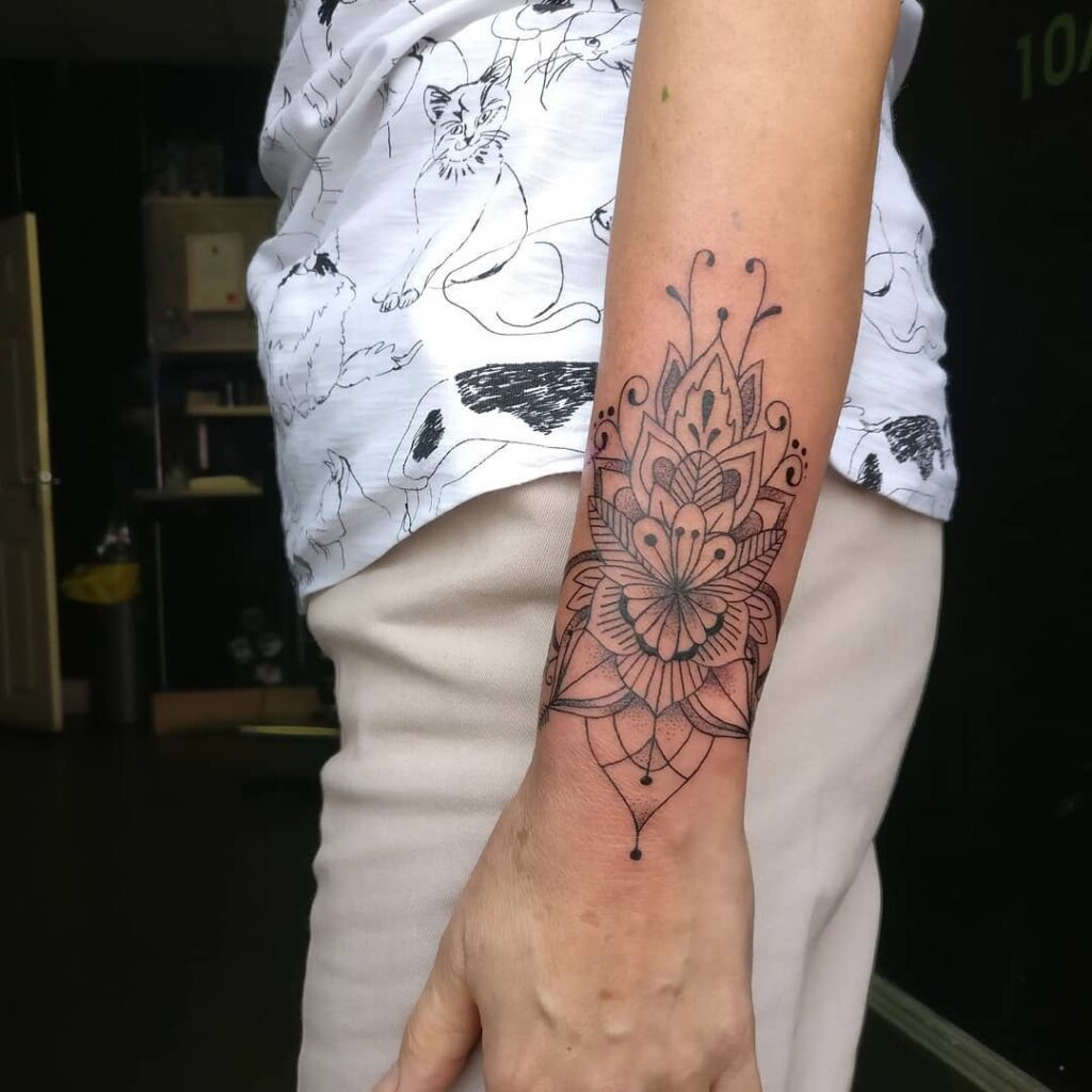 Ornamental Mandala Wrist Tattoo mandala wrist tattoo ideas tattoo