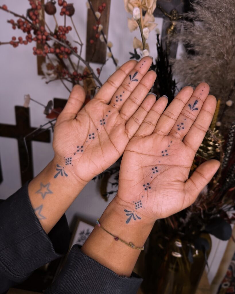 Butterfly And Botanical Hand Tattoo Design