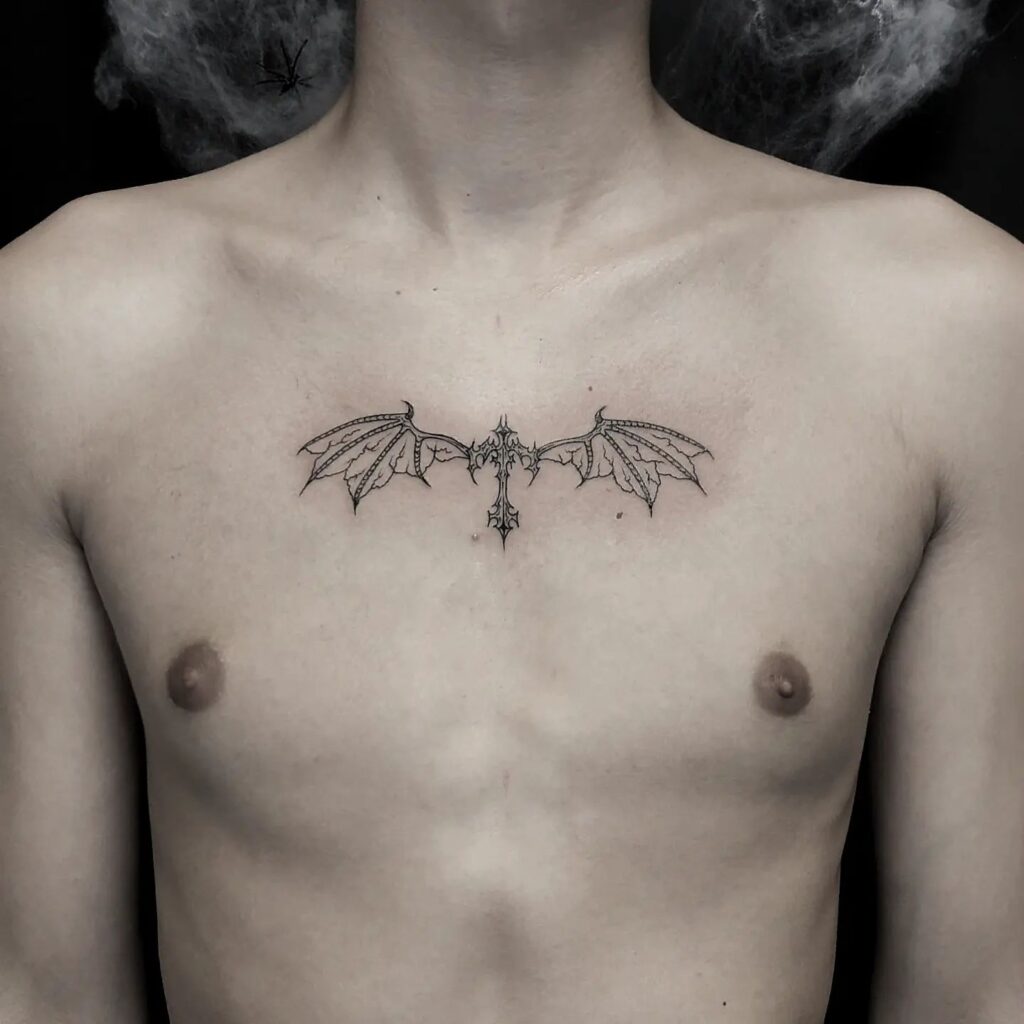 Ornate Cross with Bat Wings Chest Tattoo cross tattoos for men tattoo