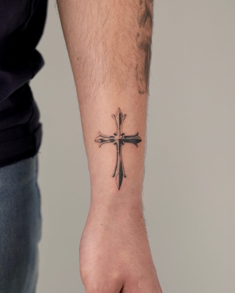 Ornate Gothic-Inspired Cross Wrist Tattoo cross tattoos for men tattoo