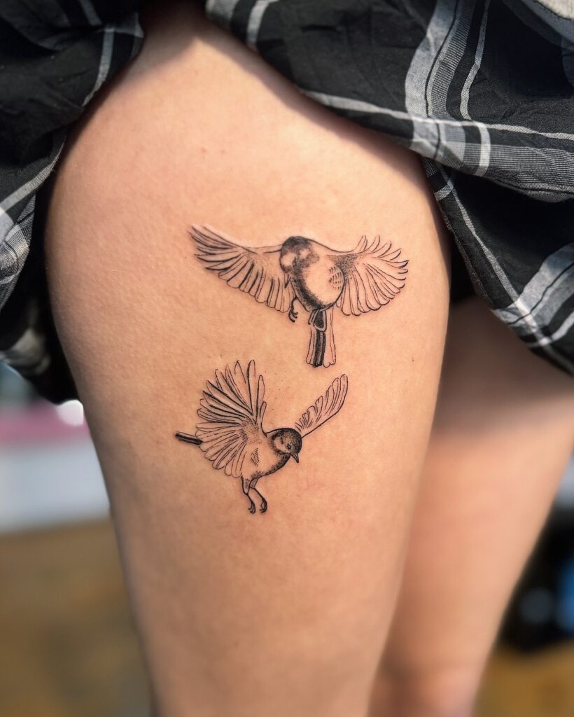 Pair of Flying Birds Thigh Tattoo bird tattoo ideas for women with meaning tattoo
