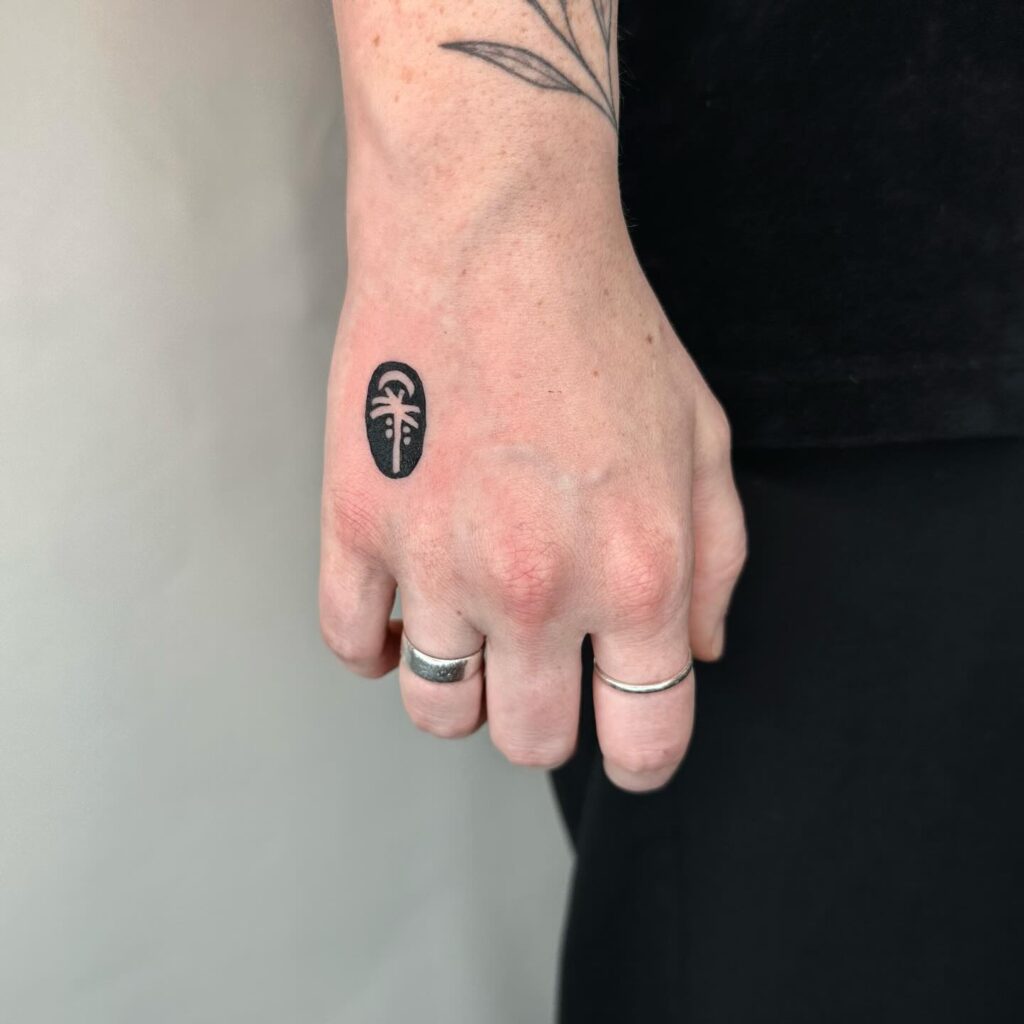 Palm Tree Oasis Tattoo hand tattoo ideas for guys tattoo