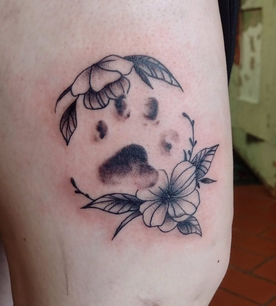 Paw Print Tattoo with Floral Frame paw print tattoo ideas tattoo