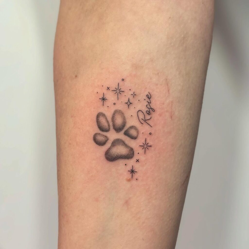 Paw Print Tattoo with Stars and Name paw print tattoo ideas tattoo