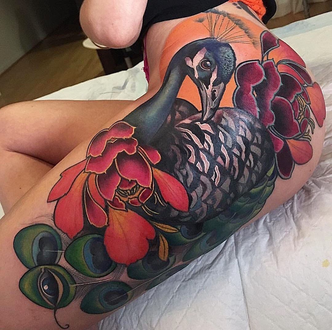 Bold Peacock And Peony Thigh Tattoo