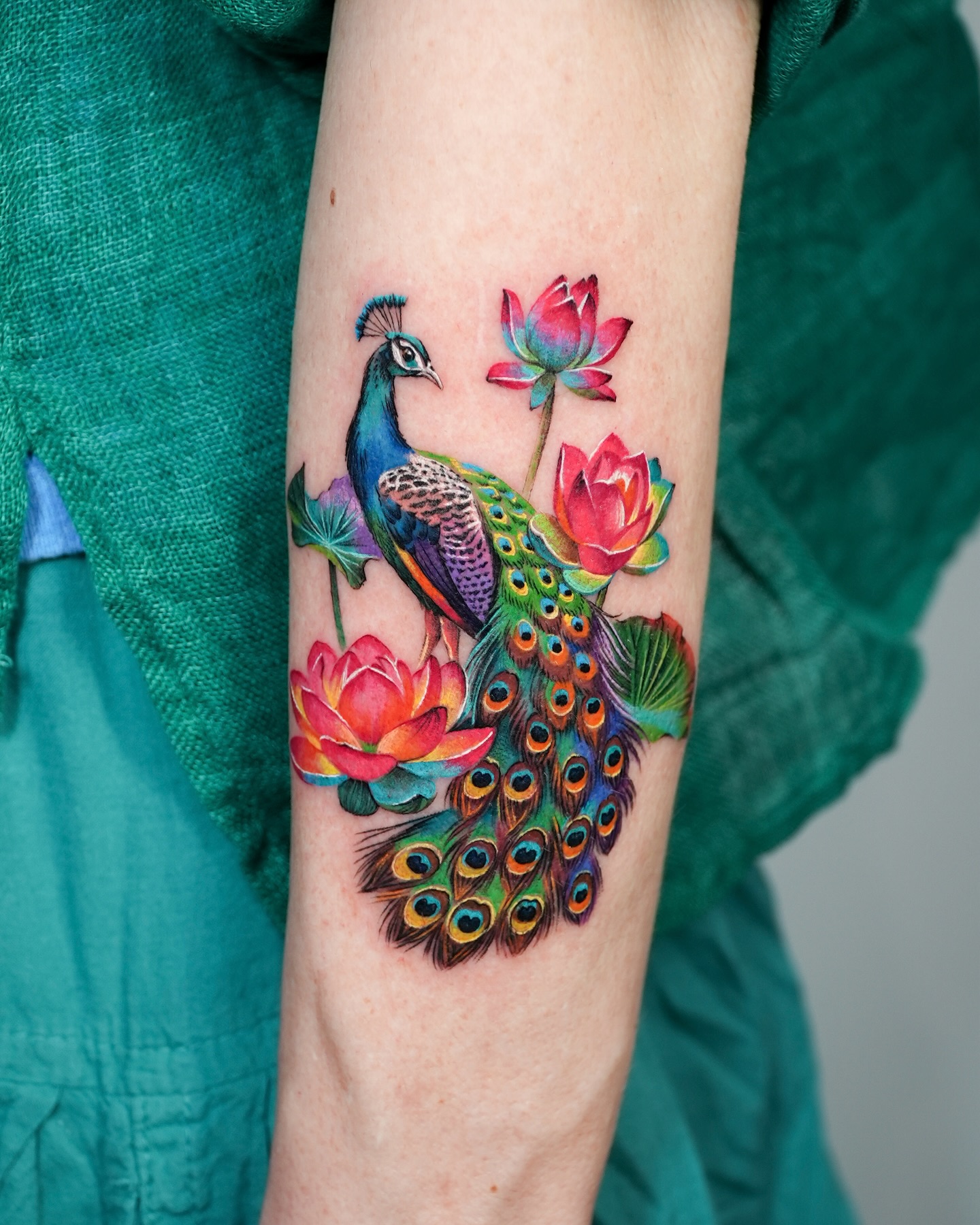 Peacock And Lotus Flower Tattoo