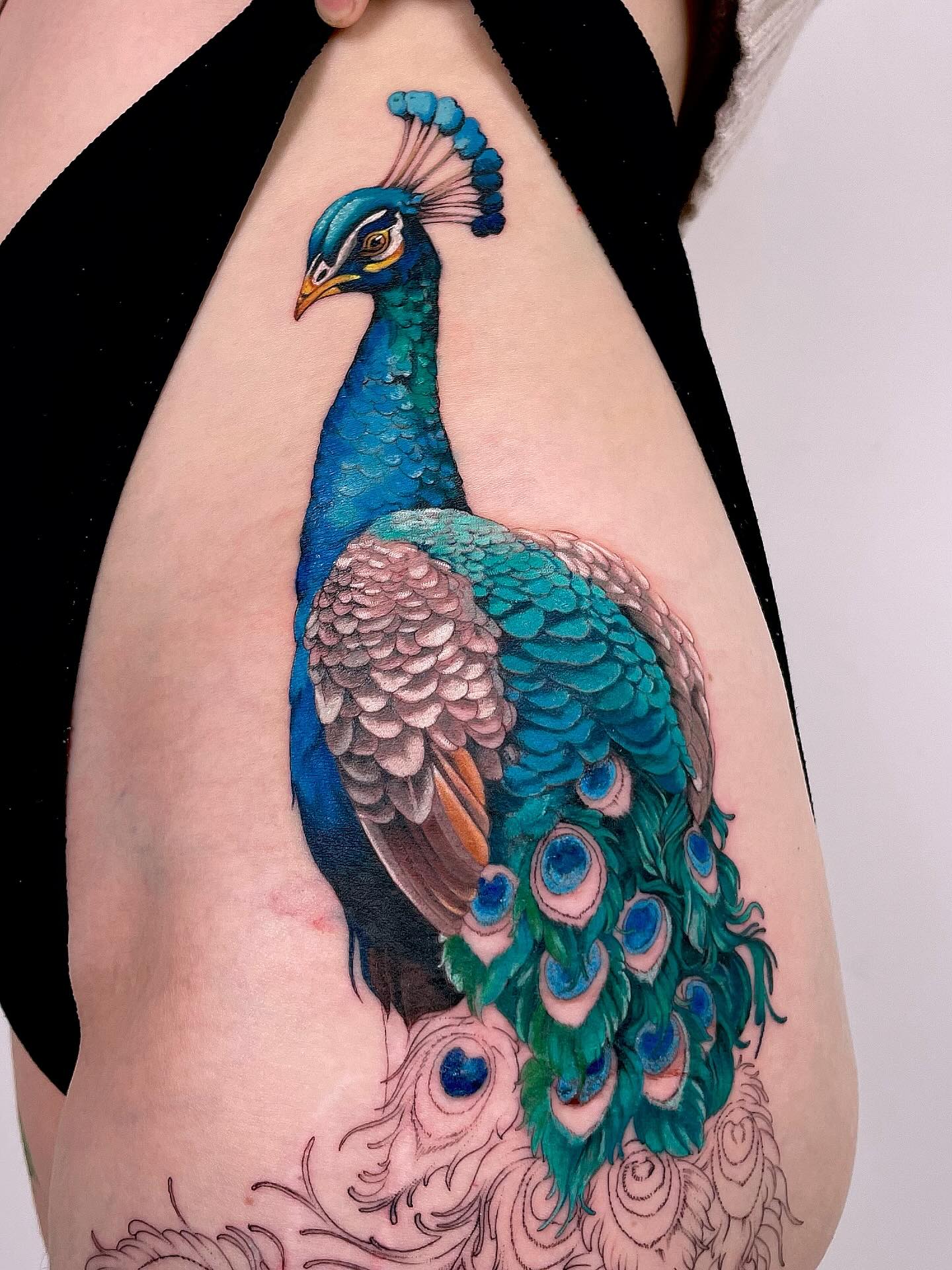 Realistic Peacock Side Tattoo