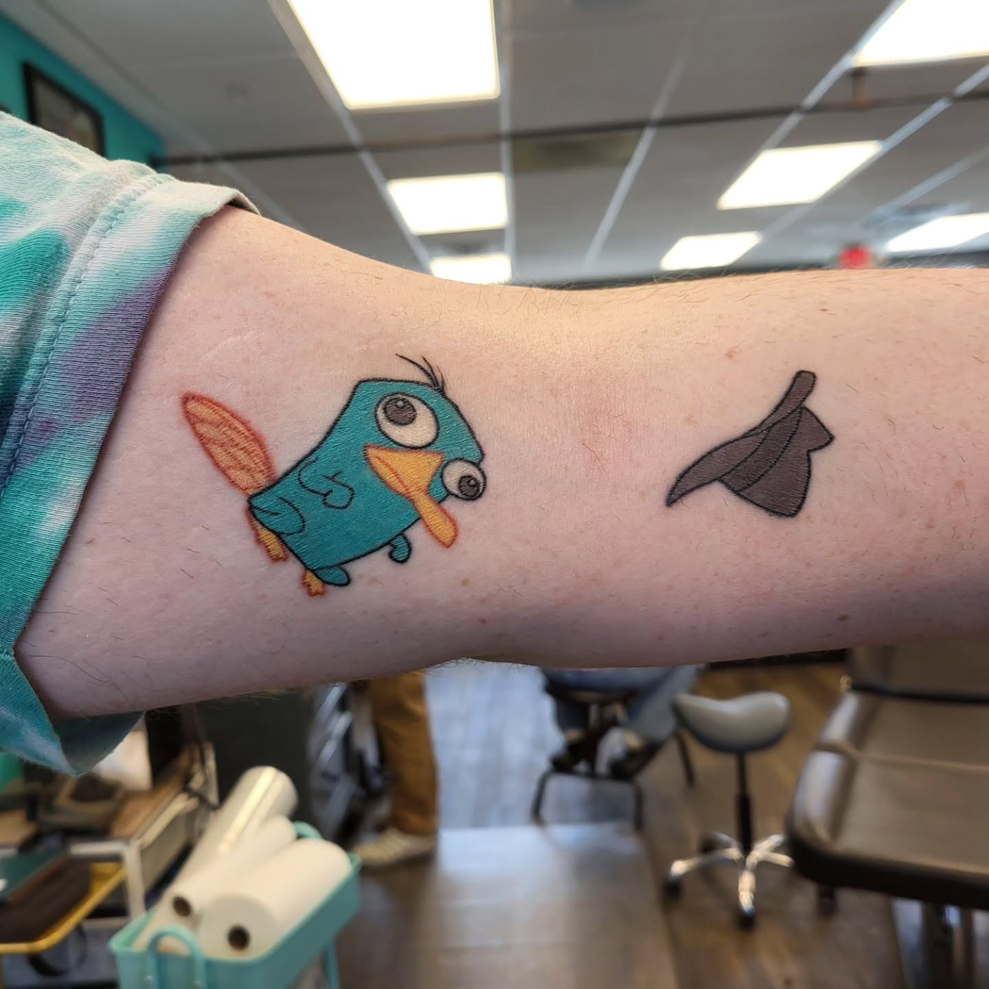 Screaming Cartoon Lifting Pencil Tattoo