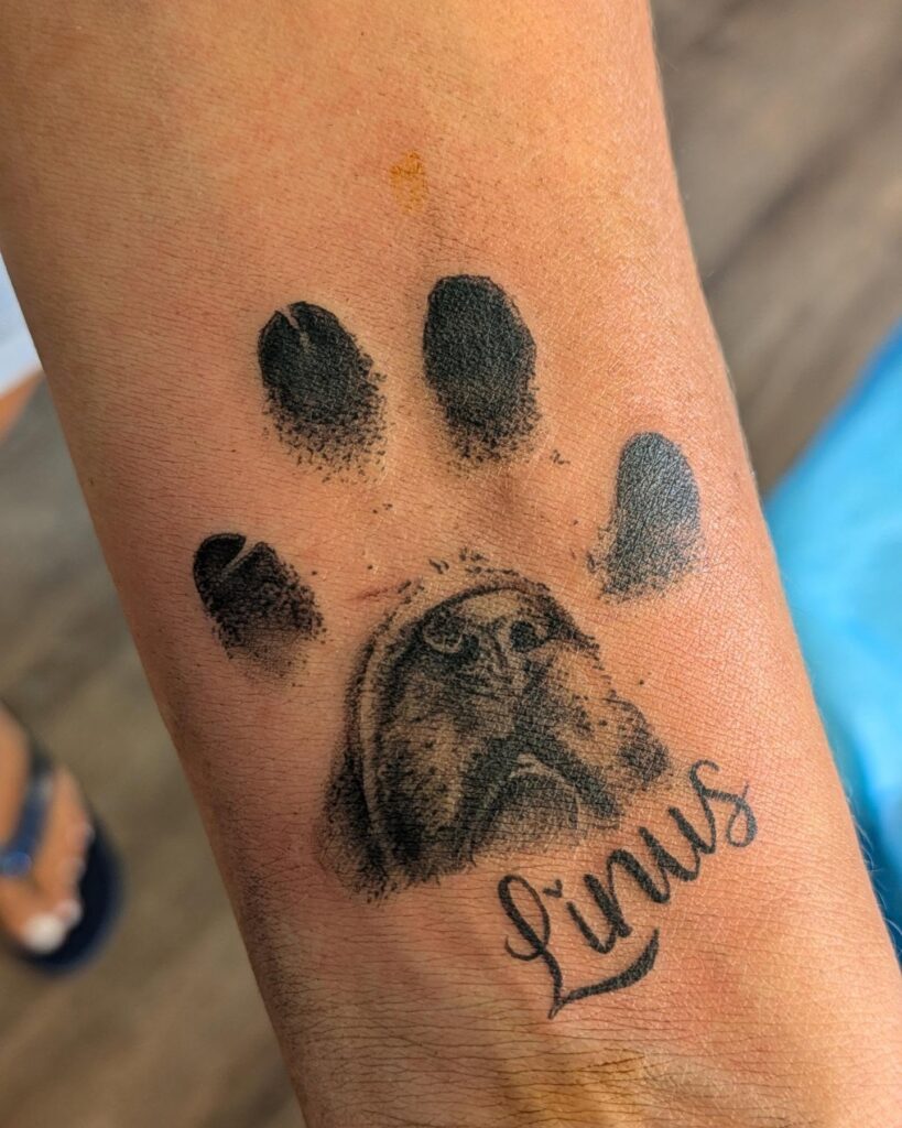 Personalized Paw Print Tattoo with Pet Portrait paw print tattoo ideas tattoo